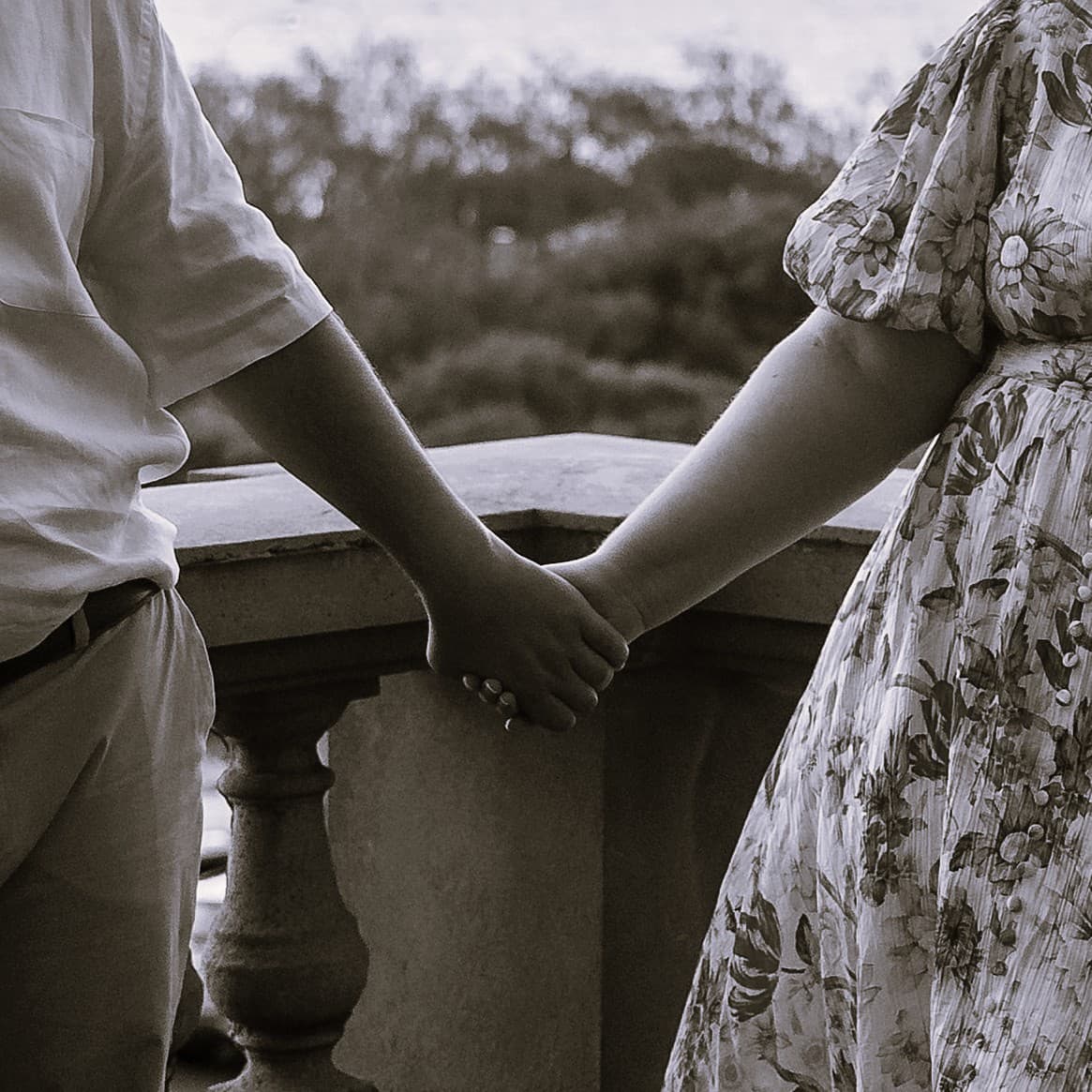 Bride and Groom Holding Hands